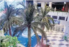  ?? TAIMY ALVAREZ/STAFF PHOTOGRAPH­ER ?? After years without water, the fountains inside the Broward Main Library in Fort Lauderdale are flowing, surrounded by new palm trees and elevators in the remodeled space.