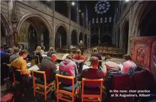  ??  ?? In the nave: choir practice at St Augustine’s, Kilburn