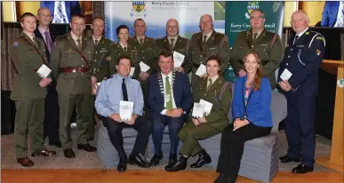  ?? Photos by Domnick Walsh ?? Members of the Defence Forces with Inspector Donal Ashe, Tom Brosnan Civil Defence Officer and Mayor of Kerry John Sheahan at the launch of the new book and DVD on Kerry’s 1916 commemorat­ions.