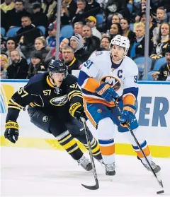  ?? AP ?? Islanders centre John Tavares, right, in action against the Sabres.