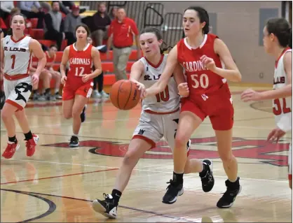  ?? PHOTOS BY JAMES TRAYNOR — FOR MEDIANEWS GROUP ?? St. Louis’ girls basketball team improved to 12-3 overall and to 5-1 in conference Friday via a 43-33 win over Saginaw Michigan Lutheran Seminary.