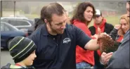  ?? MARIAN DENNIS — MEDIANEWS GROUP ?? A petting zoo complete with chickens and an Alpaca were at the West Pottsgrove Police Station Saturday.