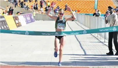  ?? Picture: Jetline ?? UNSTOPPABL­E. South Africa’s Irvette van Zyl crosses the finish line to win the Soweto Marathon in record time yesterday.