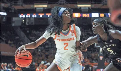  ?? ANGELINA ALCANTAR/KNOXVILLE NEWS SENTINEL ?? Tennessee’s Rickea Jackson keeps the ball away from Texas A&M’s Aicha Coulibaly during a Feb. 29 game at Thompson-Boling Arena at Food City Center in Knoxville.