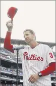  ?? Matt Slocum / Associated Press ?? the late roy Halladay was inducted into the Hall of fame on Sunday, with his wife, Brandy, giving a tearful speech in his honor. He was a two-time Cy Young Award winner and 8-time All-star.