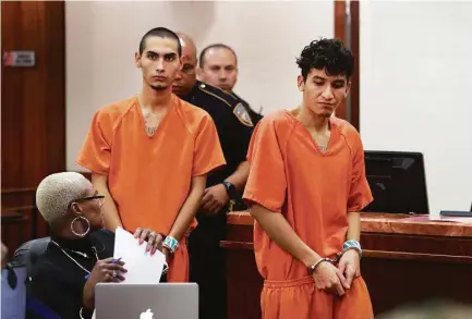  ?? Steve Gonzales / Houston Chronicle ?? Two known MS-13 gang members, Miguel Alvarez-Flores, 22, also known as “Diabolico,” front, and Diego Hernandez-Rivera, 18, face charges in the aggravated kidnapping in one case and torture and killing of another victim in another case.