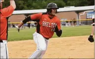  ?? Pete Paguaga / Hearst Connecticu­t Media ?? Shelton’s Anthony Steele rounds third base during the second round of the Class LL tournament against Warde in 2021.