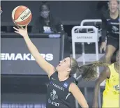  ?? PHELAN M. EBENHACK — THE ASSOCIATED PRESS ?? New York Liberty forward Sabrina Ionescu goes up for a shot against the Seattle Storm.