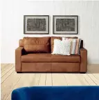  ??  ?? LEFT: ‘CALEB’ COUCH IN TAN LEATHER,
R11 995, CORICRAFT BELOW: ‘STAY’ SOFA IN BLUE SUEDE,
R77 656, CRÉMA