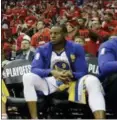  ?? DAVID J. PHILLIP — THE ASSOCIATED PRESS FILE ?? Warriors forward Andre Iguodala sits on bench during the final moments of Game 2 of Western Conference Finals against Rockets, in Houston