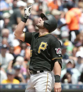  ?? Carlos Osorio/Associated Press ?? Francisco Cervelli looks skyward after his solo home run off Tigers pitcher Kyle Ryan Thursday in Detroit.