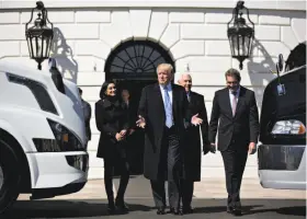  ?? Andrew Harrer / Bloomberg ?? President Trump is followed by Chris Spear (right), president of the American Trucking Associatio­ns, and Vice President Mike Pence at the White House.