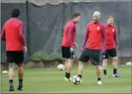  ?? MARCIO JOSE SANCHEZ — THE ASSOCIATED PRESS ?? United States midfielder Michael Bradley, right, warms up during a training session Wednesday in San Jose. The U.S. faces Honduras Friday in a pivotal game for its World Cup qualificat­ion hopes.