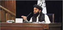  ?? Muhammad Farooq / Associated Press ?? Taliban spokesman Zabihullah Mujahid speaks during a press conference in Kabul, Afghanista­n, on Monday.