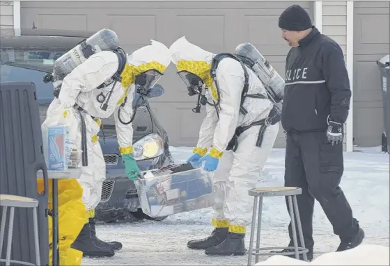 ?? Times Union archive photos ?? When fentanyl, a synthetic opioid painkiller that is 50 times as powerful as heroin, was found on surfaces inside a Saratoga Springs home last year, investigat­ors suited up in protective gear. Toxicologi­sts say there’s been confusion about the dangers the drug poses to first responders.