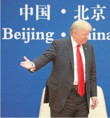  ??  ?? Trump y Xi Jinping durante un encuentro en Pekín