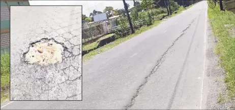  ?? ?? The northern section of the road which is currently sinking. Inset is the new pothole which developed along the rehabilita­ted 200-metre stretch