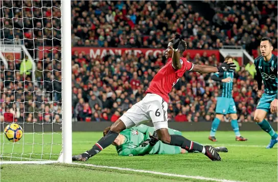  ?? PHOTOS: GETTY IMAGES ?? Paul Pogba ‘scores’ for Manchester United against Southampto­n but the goal was correctly ruled out for offside.