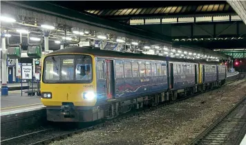  ??  ?? West Country ‘Pacers’ have carried a variety of liveries since privatisat­ion. No.143603, in one of First Great Western’s many livery variations, leads a ‘142’ about to leave Exeter St Davids with a stopping service to Paignton on
October 29, 2011.