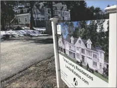  ?? MORGAN AP PHOTO/PETER ?? A sign announces newly built homes at a developmen­t in Sudbury, Ma., on March 12.