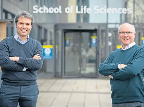  ??  ?? DELIGHTED: Dundee University professors Alessio Ciulli, left, and Sir Mike Ferguson.