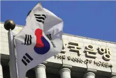  ?? — Reuters ?? The South Korean flag flutters in front of Bank of Korea in Seoul.