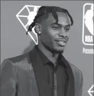  ?? ARTURO HOLMES/GETTY IMAGES ?? Davion Mitchell on the red carpet during the NBA Draft on Thursday in New York.