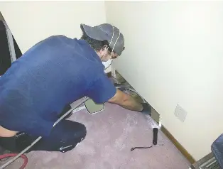  ??  ?? A technician verifies the duct work using a camera or flashlight and mirror.