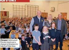  ??  ?? Cheque Calderwood Primary hand over a cheque to Rotarians to help End Polio Now