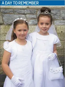  ??  ?? Meghan Fitzgerald and Kayleigh Grangel Dempsey on their First Holy Communion day in New Ross.
