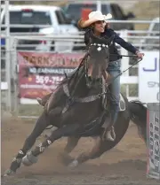  ??  ?? Sydni Blanchard, Albuquerqu­e, NM, turns the last barrel Friday, April 28, 2017 at the 69th annual Springvill­e Sierra Rodeo in Springvill­e.