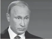  ?? MAXIM BLINOV/SPUTNIK VIAASSOCIA­TED PRESS ?? Russian President Vladimir Putin contended Thursday that allegation­s of Russian meddling were intended to distract voters from real problems in the U.S.