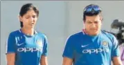  ?? BCCI ?? Sacked coach Tushar Arothe (right) with Harmanpree­t Kaur.