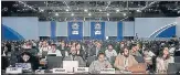  ?? AP ?? Attendees listen to a review of the state of discussion­s at the COP27 summit on Friday.