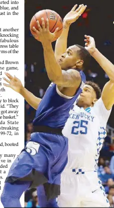  ?? AFP ?? Barry Brown of the Kansas State Wildcats drives against PJ Washington of the Kentucky Wildcats during the NCAA South Regional at Philips Arena in Atlanta, Georgia.