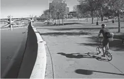  ?? PATRICK BREEN/THE REPUBLIC ?? Tempe Town Lake is just a small part of the Rio Salado corridor — and just a small glimpse of what it can become.