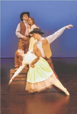  ?? CONTRIBUTE­D PHOTO ?? Dancers Caroline Blair and Dillon Davis, foreground, from Chattanoog­a Ballet perform the dream ballet. In back are Rachel Shannon and Mark Elich, who play leads Laurey and Curly in UTC’s production of “Oklahoma!”