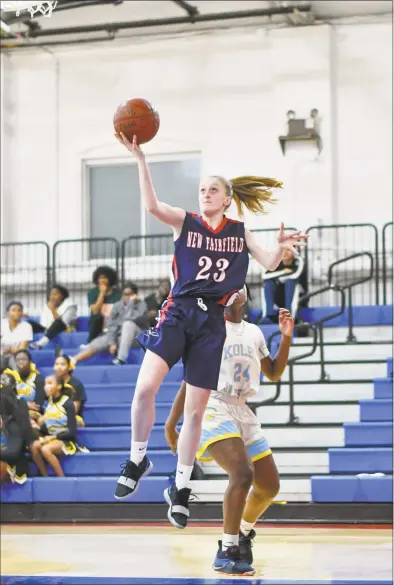  ?? Gregory Vasil / For Hearst Connecticu­t Media ?? New Fairfield’s Kelly Ford gets to the basket for a layup during a game against Kolbe Cathedral on Thursday at the Shehan Center in Bridgeport. Kolbe won, 49-41.