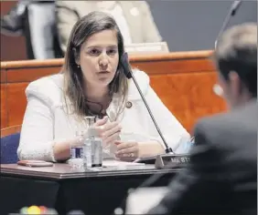  ?? Greg Nash / The Hill / Bloomberg ?? Representa­tive Elise Stefanik, a Republican, questions Mark Esper, U.S. secretary of defense, right, during a House Armed Services Committee hearing in Washington, D.C., on July 9.