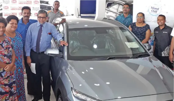  ?? Photo: Inoke Rabonu ?? Season for Joy Christmas promotion brand new Hyundai Kona winners (from left:) Arieta Tokovou, Lavenia Waqanidrol­a, Ajay Kumar (back) with Carpenters Fiji Limited director retail and marketing Kunaseelan Sabaratnam and invited guests on February 27, 2020.