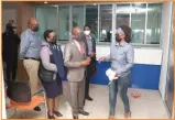  ??  ?? Molepolole Branch Manager - Mrs Maipelo Mokenane touring the branch with guests