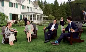  ?? ZHANG DUO / XINHUA ?? Premier Li Keqiang and his wife, Cheng Hong, talk with Canadian Prime Minister Trudeau and his wife, Sophie, at Trudeau’s residence in Ottawa on Wednesday.