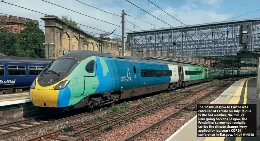  ?? PHILIP WINTER ?? The 12.40 Glasgow to Euston was cancelled at Carlisle on July 19, due to the hot weather, No. 390121 later going back to Glasgow. The ‘Pendolino’ somewhat ironically carries the climate change livery applied for last year’s COP26 conference in Glasgow.