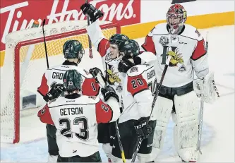  ?? DARREN CALABRESE THE CANADIAN PRESS ?? Halifax Mooseheads players celebrate going to the Memorial Cup final despite a 4-3 loss to the Rouyn-Noranda Huskies Wednesday.