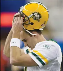  ?? Canadian Press photo ?? Edmonton Eskimos quarterbac­k Ricky Ray removes his helmet in the final minutes of a CFL game in this file photo.