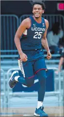  ?? AP FILE PHOTO ?? UConn senior Josh Carlton plays his final home game at Gampel Pavilion on today when the Huskies host Georgetown.