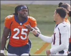  ?? Associated Press ?? TEAMMATES — Denver Broncos running back Gordon, left, greets safety Justin Simmons as they take drills during practice on Friday in Englewood, Colo.
Melvin part in