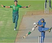  ?? — AP ?? Pakistan’s Hasan Ali celebrates the dismissal of Sri Lanka's Akila Dananjaya in their third ODI.