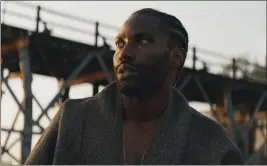 ?? 20TH CENTURY STUDIOS ?? John David Washington stars as a mercenary assigned to track down a dangerous AI figure in “The Creator,” a film that examines an issue that is starting to resonate.