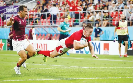  ??  ?? ↑
Wales’ Josh Adams got an ankle injury in last Saturday’s thrilling 27−23 defeat by France.
Reuters